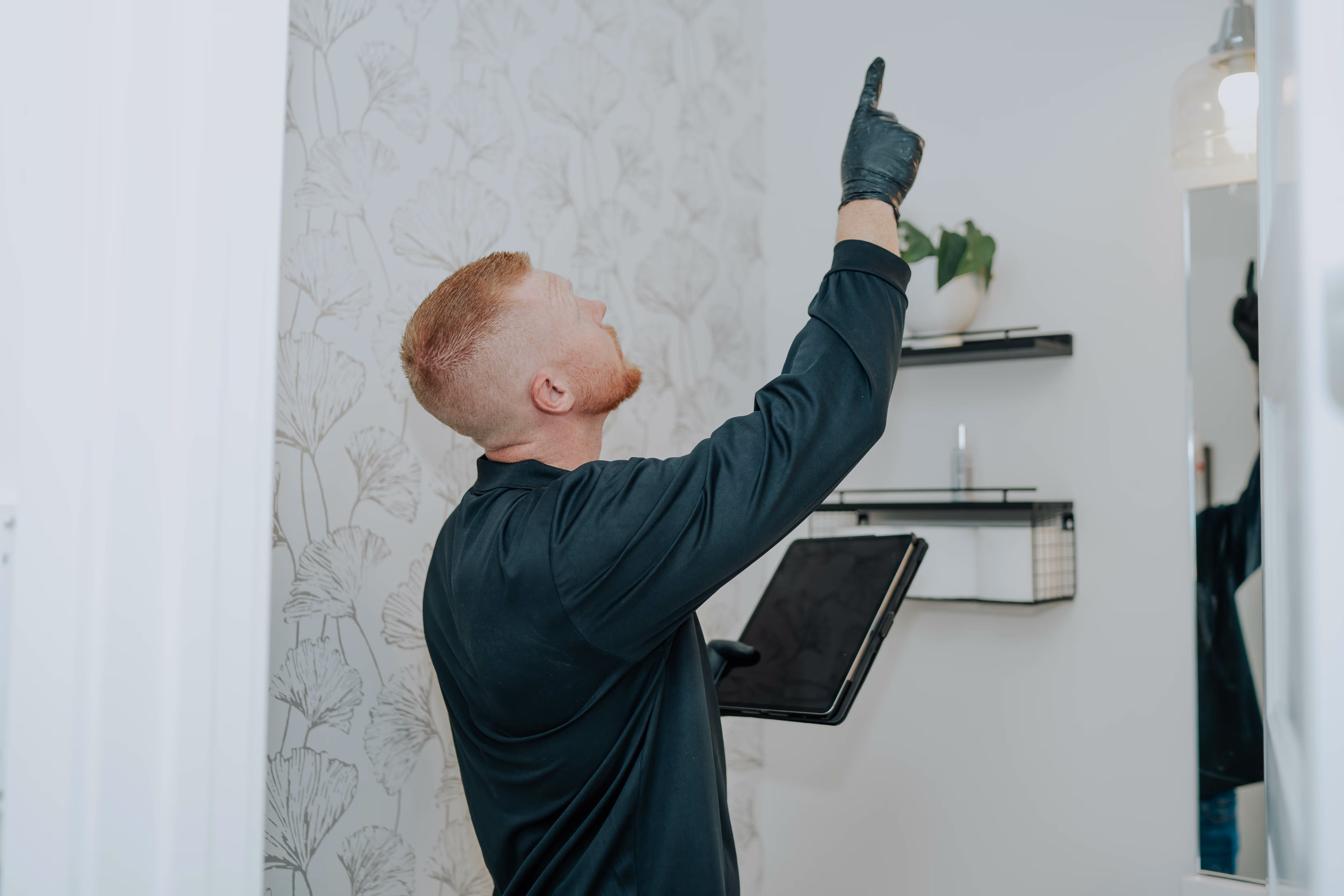 Pure Maintenance of Indy specialist inspecting a property
